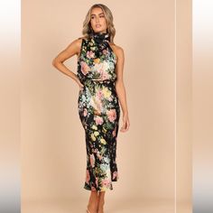 Petal And Pup: Anabelle Halter Neck Midi Dress - Black Floral, Size Medium, Runs A Bit Large Product Details Look And Feel Your Best In This Stunning Event Wear Dress! Featuring A Midi Length, An Asymmetric High Round Neckline With Gathered Pleat Detail, Plus A Back Neck Opening With Button Close, It's The Perfect Party Dress For Any Special Occasion. Not Only Does It Look Fabulous, But It Feels As Good As It Looks Too Crafted From A Soft Satin Feel Just For Extra Comfort. Midi Length Sleeveless Floral Print Midi Dress For Night Out, Floral Print Halter Neck Dress For Night Out, Halter Neck Floral Print Dress For Party, Halter Neck Floral Print Dresses For Night Out, Sleeveless Fitted Floral Dress For Party, Fitted Black Floral Maxi Dress, Elegant Black Sleeveless Floral Dress, Sleeveless Multicolor Floral Dress For Party, Floral Print Halter Neck Midi Dress For Date Night