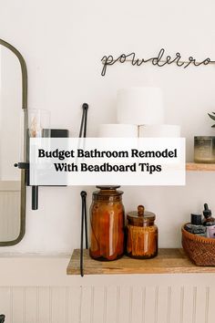 bathroom remodel with bathtub tips on top of the shelf in front of mirror