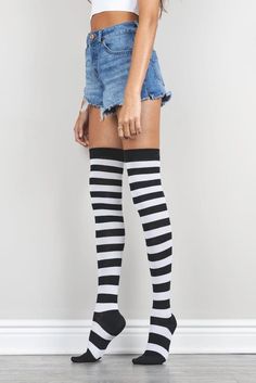 Elevate your style with our luxurious striped thigh high socks. Indulge in the soft hand feel of our slim-fitting design, carefully crafted with a blend of combed cotton. Easy to wear and lightweight, they are the perfect finishing touch to your outfit. Elevate your everyday look with these bold, yet elegant socks. Details: features: • Lightweight • Allover Striped • Breathable material & care: • Material content: Combed Cotton; Polyester; Spandex; Elastane • Wash & care: Do not Bleach; Machine Trendy Black Stretch Knee-high Socks, Trendy Black Cotton Knee-high Socks, Pink Striped Thigh High Socks, Elegant Socks, Striped Thigh High Socks, Cheap Striped Knee-high Socks For Women, Mens Novelty Socks, Mens Crew Socks, Over The Knee Socks