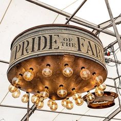 a chandelier hanging from the ceiling in a building