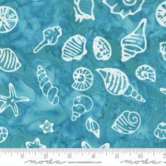 a blue background with white sea shells and starfishs on the ocean floor, as well as a ruler