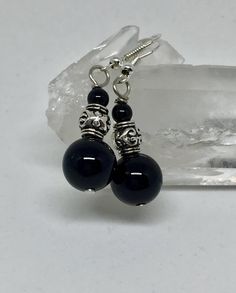 Black onyx silver earrings, black stone earrings, healing stone by ItsMyCreativeNature on Etsy https://www.etsy.com/listing/590032269/black-onyx-silver-earrings-black-stone Black Onyx Jewelry With Silver Beads, Elegant Black Bead Earrings, Elegant Black Dangle Beaded Earrings, Elegant Black Jewelry With Silver Beads, Elegant Black Beaded Earrings As Gift, Elegant Black Beaded Earrings For Gift, Black Metal Earrings With Round Beads, Black Onyx Earrings For Parties, Black Dangle Earrings With Black Beads