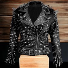 Women's Studded Jacket, Black Punk Long Silver Studded Spiked Brando Style Motorcycle Leather jacket - Nietenbesetzte Lederjacke About this item *MATERIAL: Women's Full Long Spiked Genuine Leather jacket Handcrafted Fully Studded Jacket from the finest quality Real leather and has a soft viscose inner lining that ensures durability and comfort. *STYLE: High quality Premium Leather, Soft and Comfortable Inner Lining, Full Long Spiked on Shoulder and Cuffs Sleeve. YKK Zip on Front and Sleeve. *Siz Fall Biker Jacket With Spikes And Long Sleeves, Fall Long Sleeve Biker Jacket With Spikes, Fall Leather Jacket With Spikes And Long Sleeves, Fitted Winter Outerwear With Spikes, Fitted Long Sleeve Biker Jacket With Spikes, Fitted Long Sleeve Outerwear With Spikes, Alternative Fashion Leather Jacket With Spikes, Biker Jacket With Spikes And Long Sleeves, Spiked Long Sleeve Biker Jacket For Streetwear