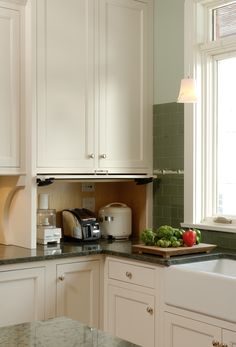 the kitchen counter is clean and ready for us to use in the day time,