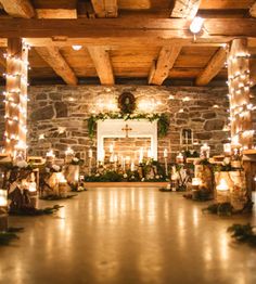 a large room with candles and decorations on the floor