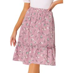 Made of floral-printed fabric, this midi skirt is high-waisted featuring an A-line silhouette. This flowy midi skirt with a tiered design and vintage allover floral prints. Featuring an A-line and tiered details, it is a summer casual skirt to be paired well with a top and sandals for a cute day look and with a stylish T-shirt and vintage high heels for a charming inspired look. Feminine Flared Skirt With Floral Print, Spring Knee-length Mini Skirt With Elastic Waistband, Knee-length Mini Skirt With Elastic Waistband For Spring, Spring Mini Skirt With Elastic Waistband, Knee-length, Feminine Floral Print Relaxed Skirt, Feminine Knee-length Lined Mini Skirt, Flowy Knee-length Mini Skirt For Spring, Flowy Floral Print Skirt, Floral Print Knee-length Skirt