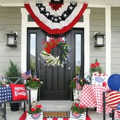 a patriotic porch decorated for the fourth of july