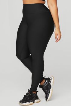 Just as perfect for out and about as they are for a good sweat session. These leggings are made from Airlift—our most compressive, supportive fabric with a sheeny finish and four-way-stretch for a glove-like fit. The high-rise waistband is double-layered for a sleek look, and the full-length legs are designed to hit at the ankle. Choose your favorite color(s) and get ready to wear yours on repeat. Solid 4-way Stretch Squat Proof Activewear, Squat Proof Solid Activewear With 4-way Stretch, Versatile Micro-elastic Bottoms By Alo Yoga, Versatile Solid Compression Activewear, Versatile Compression Activewear In Solid Color, Black 4-way Stretch Leggings For Sports, Alo Yoga Compressive Moisture-wicking Activewear, Solid Sporty Squat Proof Tights, High Stretch Alo Yoga Pants For Gym