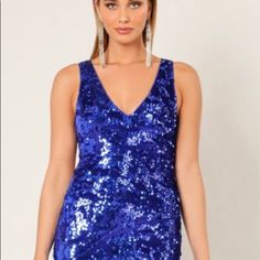 Wow Couture Evening Dress Blue Bodycon Dress For Prom And Party Season, Blue Bodycon Dress For Prom Party Season, Glamorous Blue Sleeveless Bodycon Dress, Blue Sleeveless Glamorous Bodycon Dress, Glamorous Sleeveless Blue Bodycon Dress, Glamorous Blue Bodycon Cocktail Dress, Glamorous Blue Cocktail Bodycon Dress, Elegant Blue Mini Dress For Party, Blue Sequined Fitted Dress