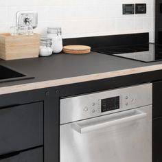 the kitchen counter is clean and ready to be used as a dishwasher or oven