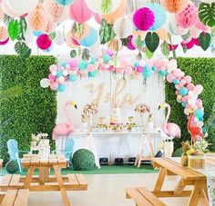 the instagram page on instagram is filled with balloons and flamingo - themed decorations