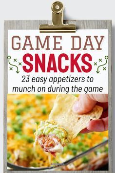 the cover of game day snacks, which is being held by a clipboard with an image of a hand holding a tortilla