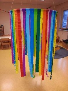 a multicolored wind chime hanging from the ceiling