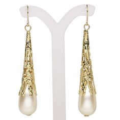 Gold-finished steel and lightweight acrylic-based "pearls" create understated elegance at a fraction of the price. Ready-to-wear earrings add to retail displays and counter sales. Elegant Metal Jewelry With Fish Hook, Elegant Metal Jewelry With Hook Closure, White Long Drop Teardrop Earrings For Party, Teardrop Metal Pearl Earrings, White Drop Earrings With Fish Hooks, White Dangle Earrings With Fish Hook, Teardrop Pearl Earrings In Metal, Teardrop Pearl Earrings With Metal Ear Wire, White Metal Chandelier Earrings