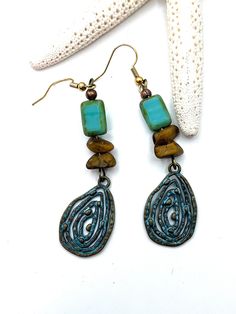 "Gorgeous patina and Czech glass pair of dangly earrings 3\" long Tear drop shape" Bohemian Drop Metal Earrings, Czech Glass Teardrop Dangle Earrings With Ear Wire, Bronze Metal Dangle Teardrop Earrings, Bronze Metal Teardrop Dangle Earrings, Adjustable Teardrop Bronze Earrings, Dangle Czech Glass Beaded Earrings, Dangle Beaded Earrings With Czech Glass, Unique Czech Glass Teardrop Jewelry, Unique Teardrop Chandelier Earrings