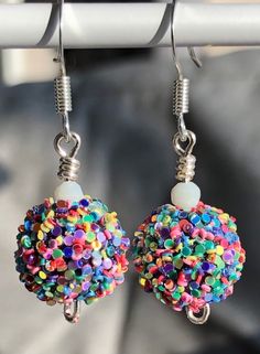 Colorful earrings for a birthday party. Cute glitter confetti dangle earrings are girly pastel earrings that will make a fun birthday gift to wear on your special day!  Adorable 1" earrings * Just the right size for women or girls  * Fun glittery confetti earrings * Silver fish hook ear wires * Rubber back stoppers More Dangle Earrings https://www.etsy.com/shop/MiksJewelryShop?ref=seller-platform-mcnav&search_query=dangle+earrings My Jewelry Collection https://www.etsy.com/shop/MiksJewelryShop?r Confetti Earrings, Birthday Earrings, Iridescent Earrings, Pastel Earrings, Birthday Accessories, Girls Fun, Glitter Birthday, Birthday Jewelry, Glitter Confetti