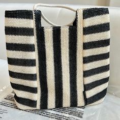 Brand New. Black & Cream Striped Tote Bag. Inside Has A Zipper Pocket. Please See Photos For Measurements. Black Rectangular Straw Bag For Day Out, Black Shoulder Bag For Summer Day Out, Black Summer Straw Bag For Shopping, Black Straw Bag For Summer Day Out, Trendy Black Straw Bag For Day Out, Summer Black Straw Bag For Day Out, Black Summer Bags For Day Out, Casual Black Straw Bag For Day Out, Summer Black Bag For Day Out