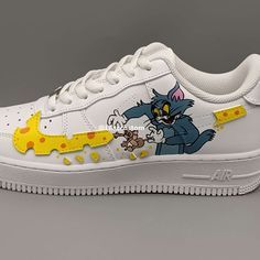 "Customize your kicks with the Nike Air Force 1 Cartoon Character Custom. Express your personality with a one-of-a-kind design featuring your favorite cartoon character. Expertly crafted for comfort and durability. Upgrade your sneaker game today." ★ Brand new with box ★ Each pair is unique and one of a kind ★ Each pair is personally handmade, painted with high quality Angelus. ★ Leather acrylic paint. Topped with a clear coat for extra protection. ★ Available in all sizes including men and wome Air Force 1 Cartoon, Favorite Cartoon Character, 12th Man, Sneaker Games, Clear Coat, Nike Air Force 1, Cartoon Character, Our Kids, Air Force 1