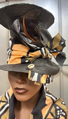 A touch of the Zulu Tribe . This is a tall hat that is sure to attract attention . It is raising the bar. It has african fabrics, leather , feathers and cowrie Shells. For more designs visit Evelyncreationinc @ etsy.com Do t delay order yours today. Bohemian Fitted Sun Hat With Short Brim, Fitted Bohemian Sun Hat With Short Brim, Traditional Black Summer Hats, Bohemian Top Hat With Short Brim For Beach, Bohemian Wide Brim Cloche Hat, Traditional Black Beach Hat, Black Bohemian Costume Hats And Headpieces, Bohemian Black Hat One Size Fits Most, Bohemian Cloche Hat For Beach