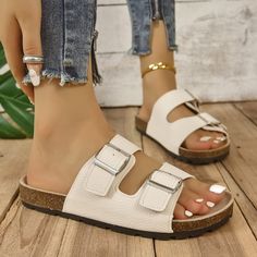 INCLUDES: Sandals FIT: This item is true to size AVAILABILITY: This item will ship separately from the rest of your order. Please allow 5-10 business days for shipping. FEATURES: Heel height: Flats Material: elastomer, polyester, pu Imported MEASUREMENTS: 35(US4):Foot length 8.8 in 36(US5):Foot length 9 in 37(US6):Foot length 9.2 in 38(US7):Foot length 9.4 in 39(US8):Foot length 9.6 in 40(US9):Foot length 9.8 in 41(US10):Foot length 10 in 42(US10.5):Foot length 10.2 in 43(US11):Foot length 10.4 in Summer Toe Post Footbed Sandals With Buckle Closure, White Buckle Closure Flip Flops With Round Toe, White Flip Flops With Buckle Closure, White Buckle Closure Round Toe Flip Flops, Synthetic Open Toe Slippers With Buckle Closure, Casual Toe Post Footbed Sandals With Buckle Closure, Casual Toe Post Footbed Sandals With Buckle, Summer Toe Post Footbed Sandals With Cork-bed Midsoles, Synthetic Open Toe Flip Flops With Buckle Closure