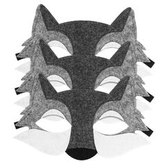 an animal mask with four different eyes and one black fox's head on it