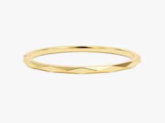 Crafted from the finest 14k gold, this bangle showcases a sleek, avant-garde geometric design. The clean lines and bold shapes make a powerful statement, turning your wrist into a canvas of modern sophistication. Wear it solo for a minimalist yet impactful look, or stack it with other bracelets to curate your unique style narrative.Features• Made to Order• Gold Kt: 14K• Gold Colors: Rose Gold, Yellow Gold, White Gold• Width: 3.70 mm• Thickness: 3.00 mm Modern Yellow Gold Cuff Bracelet With Shiny Finish, Modern Shiny Yellow Gold Cuff Bracelet, Modern Yellow Gold Bangle Cuff Bracelet, Modern Yellow Gold Polished Cuff Bracelet, Modern Round Gold Bracelet With Polished Finish, Modern Yellow Gold Bracelet With Shiny Finish, Modern Yellow Gold Bangle Bracelets, Modern Yellow Gold Bangle With Polished Finish, Modern Polished Gold Round Bracelet