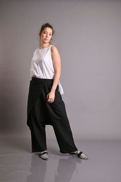 Linen Pants, Harem Pants, Beige Pants ◾ Black LINEN pants. Loose harem pants. Summer comfortable quality linen pants. Natural linen pants. The pants are very comfy. These pants are both sports and everyday.  You can go to work with them, you can also wear them in the free days. They have a sporty elegant style.  Loose fitting. ✂ Fabric: 100% lINEN Model wearring size S. Heigth: 176 cm- 5"8 inches Fabric: ►Quality NATURAL linen fabric. medium weight (200 g) linen fabric Model wearring size S. ◾ T Baggy Wide Leg Festival Pants, Bohemian High-waisted Relaxed Fit Harem Pants, Bohemian Baggy Straight Pants, Baggy Ankle-length Pants For Festival, Sporty Elegant Style, Natural Linen Pants, Beige Hose, Black Linen Pants, Bohemian Pants