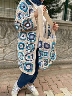 The most beautiful shades of blue combined with beige, a soft spring cardigan. It is knitted with sweatproof, 1st quality cotton yarn. The ground color can be changed. Bag sold separately One Size Beige Crochet Cardigan, Beige Crochet Bohemian Cardigan, Bohemian Hand Knitted Cardigan For Beach, Bohemian Hand Knitted Beach Cardigan, Bohemian Hand-knitted Cardigan For Beach, Bohemian Hand-knitted Beach Cardigan, Beige Knitted Bohemian Outerwear, Cream Knitted Bohemian Outerwear, Bohemian Cream Knitted Outerwear