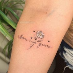 a woman's arm with a flower and the words when we grow on it