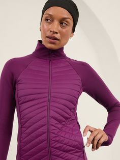 FOR: Medium to high-impact workouts at the gym, studio, or outdoors FEEL: Chafe-free seamless construction for maximum comfort FAVE: High collar adds extra warmth Thumbholes hold sleeves in place and keep warmth in Secure zip pockets to store your essentials Fitted next to the body High hip, sits at the high hip Body length in size medium: Regular 25 1/2", Petite 24", Tall 27", Plus/Size 2X 27 3/4". Fitted Winter Training Outerwear, Fitted Winter Running Outerwear, Fitted Winter Outerwear For Training, High Stretch Nylon Outerwear For Athleisure, High Stretch Nylon Sports Outerwear, High Stretch Nylon Outerwear For Sports, Sports Nylon Outerwear With High Stretch, Winter Nylon Activewear For Outdoor Activities, Winter Running Stretch Outerwear