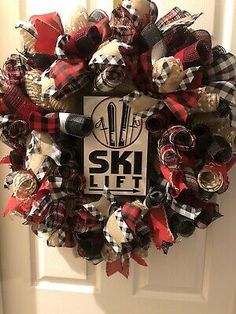 a wreath that is hanging on the door