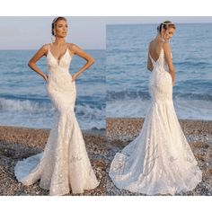 a woman in a wedding dress standing on the beach