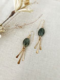 All Designs, Copyright © 2017 Nox Jewelry  The Starla earrings are made from your choice  14k Gold Filled or Sterling Silver. Each earring is paired with your choice of gemstone: lapis, labradorite, chrysoprase, iolite or kyanite. Metal fringe ( cut to shape and hammered  tips) is added giving this earring beautiful movement.  - 14k gold filled or Sterling silver Ear Wires  - Choice of gemstone: lapis, labradorite, chrysoprase, iolite or kyanite - Approx Size: 2.5" Long ( at its longest point) 1 Gemstone Earring Ideas, Fall 2024 Fashion Trends Jewelry, Unique Jewelry Photography, Dainty Beaded Earrings, Earring Photography Styling, Jewelry Inspo Aesthetic, Metal Fringe Earrings, How To Solder Jewelry, Earring Making Ideas