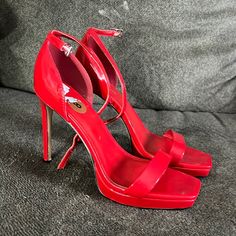 Worn Once. New Without Tags. Red Synthetic Heels With 4-inch Heel, Red High Heels With Heel Strap, Red Platform Heels With Open Heel, Red Open Heel Shoes With 4-inch Heel, Red Heels With 4-inch Open Heel, Red Open Heel 4-inch Heels, Red Open Heel Heels With 4-inch Heel, Red Synthetic Open Heel Heels, Bold Red Ankle Strap Heels