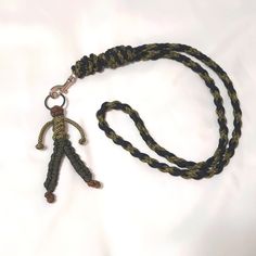 a lanyard with a keychain that has a figure on it