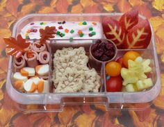 a plastic container filled with lots of food