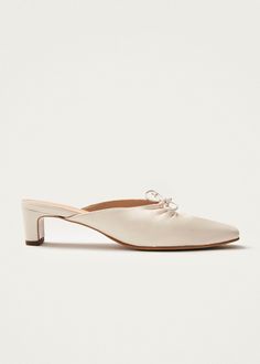 Amar Cream Leather Mules | ALOHAS Elegant Beige Flat Heel Mules, Elegant Almond Toe Mules With Leather Sole, Chic Flat Heel Mules With Wrapped Heel, Chic Mules With Wrapped Flat Heel, Chic Beige Low Heel Mules, Elegant Mules With Sculpted Flat Heel, Cream Leather Mules With Flat Heel, Elegant Low Heel Mules With Leather Sole, Elegant Beige Pointed Toe Mules