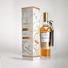 a bottle of macallan is next to a box