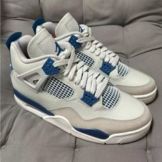 New With Box The Air Jordan 4 Retro Military Blue 2024 Stands As A Beacon Of Jordan Brand's Innovation And Style. It Features An Off-White Leather Base Contrasted With The Striking Military Blue Splashed On The Eyelet Wings, Heel, And Parts Of The Midsole, Creating A Look Of Disciplined Yet Daring Design. The Neutral Grey Touches On The Forefoot And Outsole Balance The Aesthetic, Highlighting The Sneaker's Clean Lines And Geometric Shapes. Industrial Blue Jordan 4, Jordan 4 Industrial Blue, Industrial Blue Jordan 4 Outfit, Blue Jordan 4’s, Jordan 4s Blue, Jordan 4 Bleu, Jordan 3 Blue, Jordan 4 Blue, Jordan 4 Military Blue