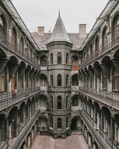 an old building with many windows and balconies