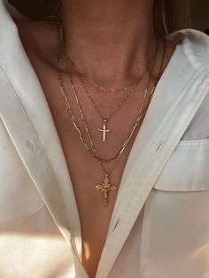 DESCRIPTIONTake us to church. A cross pendant lined with diamond cuts placed on our Singapore Chain makes the perfect everyday necklace. Layer with The Crucifix Necklace for effect. DETAILS- always made in 14k gold- pendant measurement: 22mm x 12mm- model wears a 18" Luxury Cross Pendant Necklace With Large Pendant, Luxury Cross Necklace In Fine Jewelry Style, Affordable Metal Cross Charm Necklace, Cheap Gold Cross Chain Necklace, Luxury Timeless Cross Pendant Jewelry, Luxury Metal Cross Necklace, Luxury Classic Yellow Gold Cross Necklace, Gold Crucifix Necklace, Layered Cross Necklace