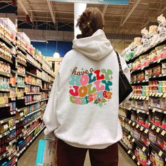 "Holly Jolly Christmas Hoodie, Holly Jolly Babe Hoodie, Cute Christmas Hoodie,Christmas Women Gift,Holly Jolly Hoodie,Merry Christmas Hoodie   PRODUCT DETAILS 💫Youth Hoodies do not have drawcord for added safety💫 - Our hoodies are made for comfort with a 50% cotton and 50% polyester blend. - They're built to last with a medium-heavy fabric  (8.0 oz/yd² (271 g/m - Enjoy a relaxed fit and a sewn-in label. - Get the right size with our true-to-size guide.   SIZING - Find your perfect fit in our s Babe Hoodie, Christmas Dental, Holly Jolly Christmas, Hoodie Cute, Gifts For Dentist, Christmas Hoodie, Business Checks, Jolly Christmas, Dental Hygiene