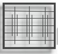 a black and white photo of a window with bars on it's glass frame