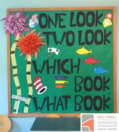 a bulletin board with the words, one look two look which book what book?