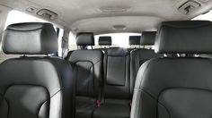 the interior of a vehicle with black leather seats