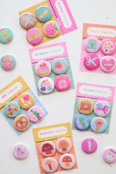 buttons and magnets are displayed on a table