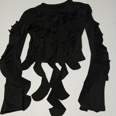 Black Gothic "Octopus Tentacle" Long-Sleeved Blouse Top Shredded Ruffle Details On Edges Of Sleeves And Down The Front Of Blouse Size Women's Small. Please See Photos For Measurements. Poly/Spandex Blend. Very Stretchy! Unbranded. No Hang Tag But New And Never Worn Otherwise. All Items Come From Smoke-Free And Pet-Free Home. Check Out My Other Listings For More Fun And Unique Women's Fashion, Footwear, And Accessories! Thanks For Looking! Black Emo Tops For Club, Spring Gothic Club Tops, Fitted Emo Tops For Fall, Grunge Tops For Club And Fall Season, Long Sleeve Punk Tops For Club, Stretch Grunge Party Tops, Punk Long Sleeve Tops For Club, Emo Long Sleeve Fitted Top, Stretch Grunge Tops For Party