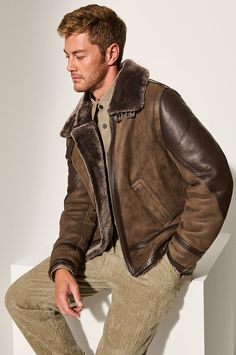 Arm yourself against wicked winter winds in the rugged Raider B-3 bomber, modeled after WWII-style jackets worn by American crews. Crafted with care from plush, naturally insulating shearling sheepskin, this zip-front bomber jacket keeps you toasty warm no matter the weather, yet offers breathability for comfortable all-day wear thanks to its natural fibers. Rich, durable lambskin leather arm patches and trim offer contrasting tone and texture, while three pockets give you space to tuck away your gloves, shades, and compass as you navigate windy terrain. Rugged Sheepskin Outerwear, Winter Shearling Leather Jacket With Zip Fly, Brown Shearling Outerwear For Outdoor, Shearling Leather Jacket With Long Sleeves And Zipper Closure, Brown Shearling Aviator Jacket, Brown Shearling Aviator Outerwear, Shearling Outerwear With Fleece Lining For Outdoor, Rugged Sheepskin Long Sleeve Outerwear, Rugged Sheepskin Outerwear For Outdoor