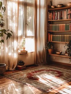 a living room filled with lots of books and plants