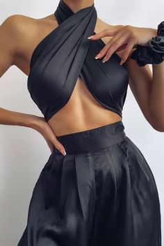 Black Halter Wrap Top And Palazzo Satin Pants Set Outfit Sets Satin Crop Top For Party, Chic Satin Sets For Night Out, Black Two-piece Evening Set, Cropped Two-piece Party Bottoms, Chic Solid Color Crop Top For Evening, Party Cropped Two-piece Bottoms, Satin Halter Neck Crop Top For Night Out, Satin Halter Neck Crop Top For Evening, Satin Crop Top For Night Out